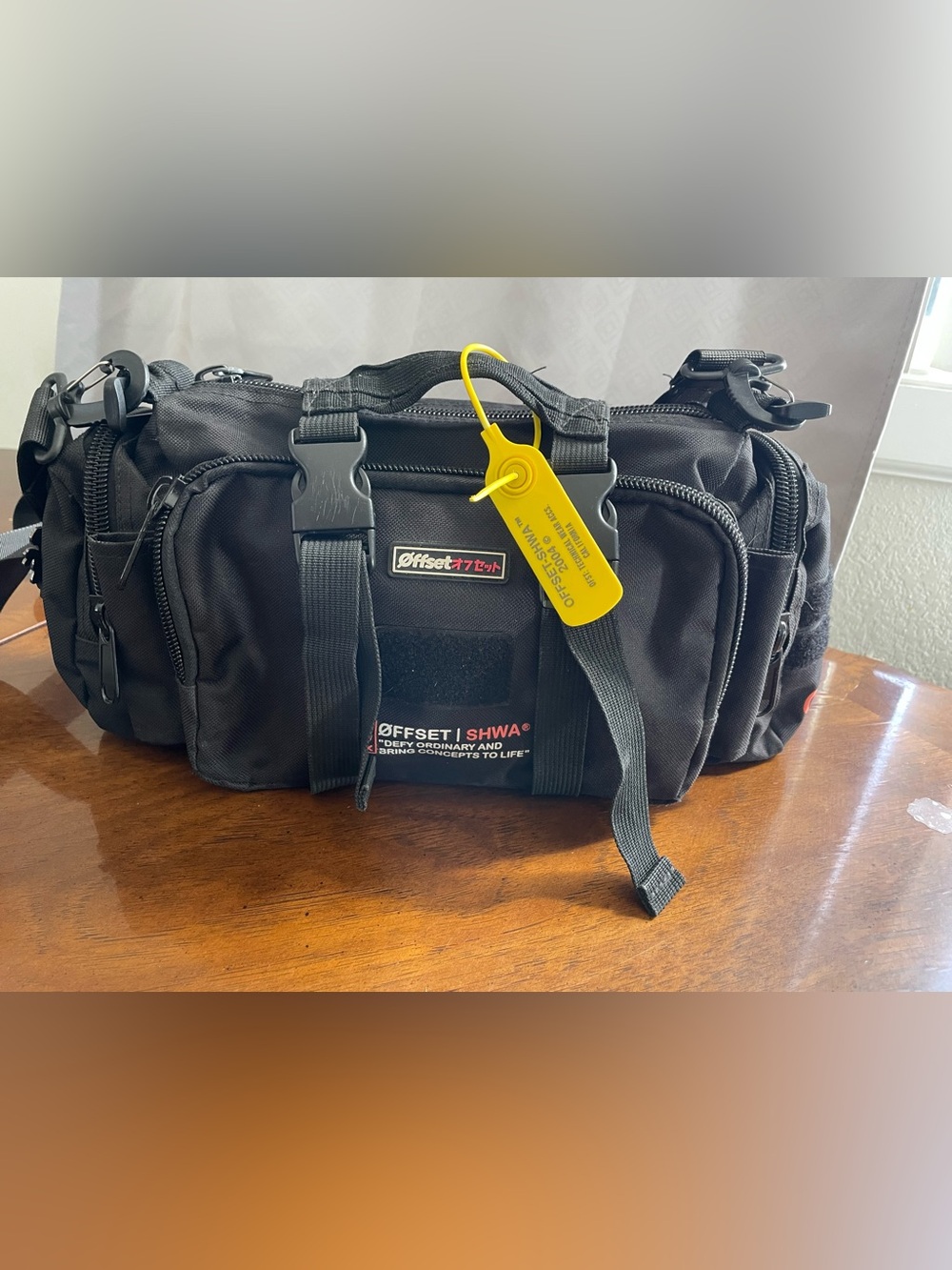 Offset | Shwa Black Crossbody Utility Bag with Yellow Tag